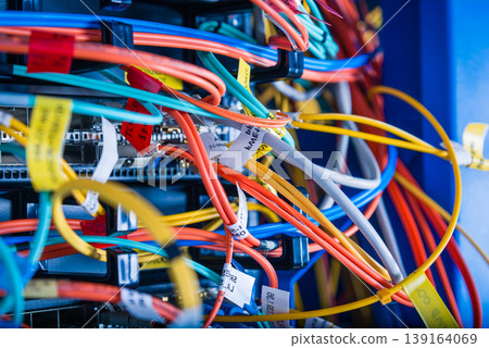 detail of server rack with fiber optic cables attached to front 139164069