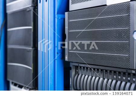 cluster of data storage SSD hard drives inside server rack 139164071