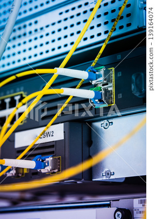 fiber optic cables connected into main data switch fiber optic cables connected into main data switch 139164074