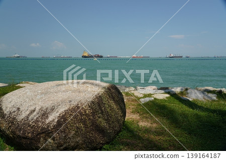 Ocean View with Rocks and Ships on the Horizon Ocean View with Rocks and Ships on the Horizon 139164187