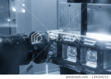 High-performance horizontal CNC milling machine cutting aluminum parts with an indexable tool. High-performance horizontal CNC milling machine cutting aluminum parts with an indexable tool. 139164233