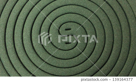 Green Spiral Mosquito Repellent with White Background 139164377