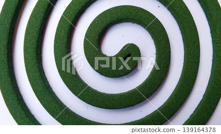 Green Spiral Mosquito Repellent with White Background Green Spiral Mosquito Repellent with White Background 139164378