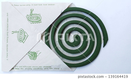 Green Spiral Mosquito Repellent with Paper Packaging, Mosquito Repellent, Insect Control on White Background 139164419