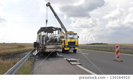 Crane Lifting Bus Highway Crane Lifting Bus Highway 139164910