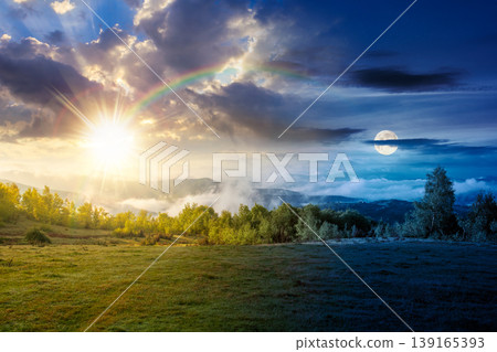 foggy carpathian mountain landscape. day meet night. outdoor adventure with stunning view in light at twilight. countryside landscape with rolling hills, fog and cloudy sky. harmony concept foggy carpathian mountain landscape. day meet night. outdoor adventure with stunning view in light at twilight. countryside landscape with rolling hills, fog and cloudy sky. harmony concept 139165393