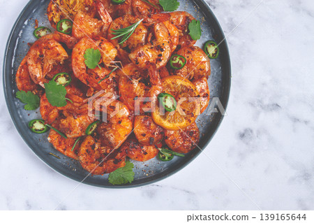 grilled shrimp, unpeeled, headless, with spices, on a marble table, homemade, no people, 139165644