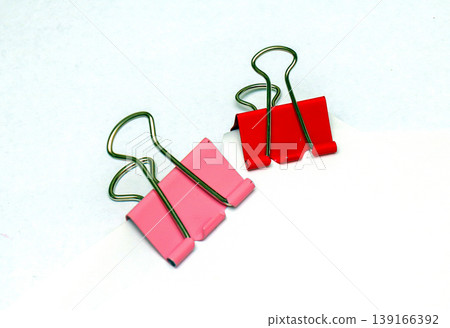Metal paper binders on white 139166392