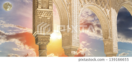 Arches in Islamic (Moorish) style (against the sunset with the super moon) in Alhambra, Granada, Spain 139166655