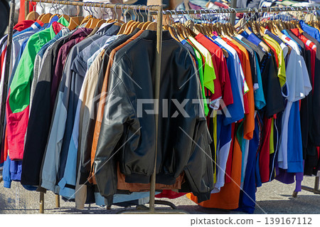 Clothes sold on flea market stall 139167112
