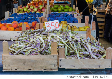 Fresh vegetables in crates on market stall 139167130