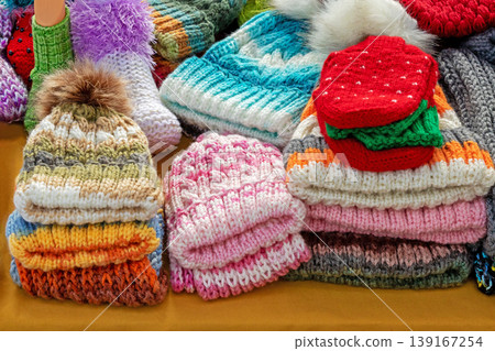 Winter hats pile sold on market Winter hats pile sold on market 139167254