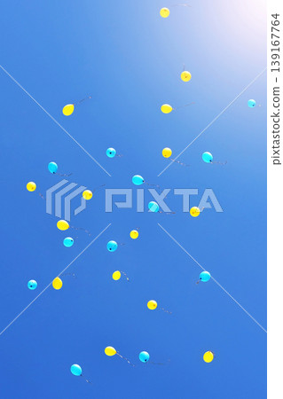 Blue and yellow balloons Blue and yellow balloons 139167764