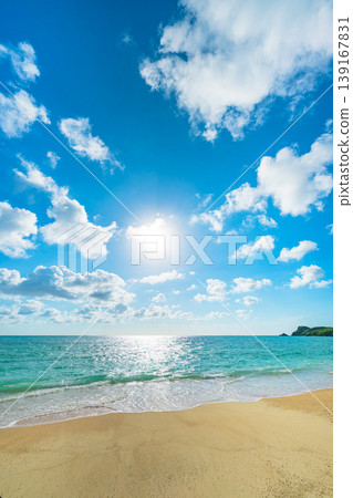 The expansive seaside scenery of Akashi Beach, with large clouds spreading across the horizon. 139167831