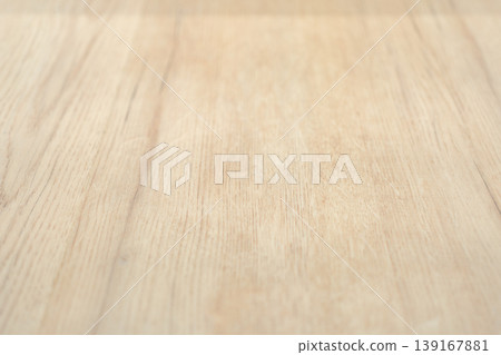 Light wooden surface with natural grain texture in soft neutral tones. Minimal background for design, product presentation, or interior concepts with clean and organic aesthetic. Light wooden surface with natural grain texture in soft neutral tones. Minimal background for design, product presentation, or interior concepts with clean and organic aesthetic. 139167881