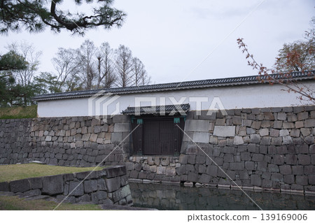 Kyoto scenery: West Gate (the rear entrance of Nijo Castle) viewed from the moat of Nijo Castle 1 139169006