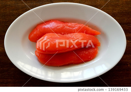 Tarako (cut pieces) as a table background, viewed from directly above. Tarako (cut pieces) as a table background, viewed from directly above. 139169433