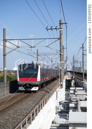 Trains departing from Maihama Station on the Keiyo Line Trains departing from Maihama Station on the Keiyo Line 139169592