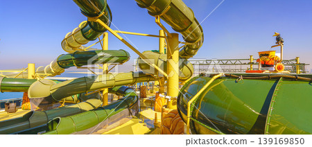 Dubai, United Arab Emirates - Jan 12 2024, view of the water slides, water park on the upper deck of the MSC Virtuosa cruise ship, at daytime, Dubai, United Arab Emirates Dubai, United Arab Emirates - Jan 12 2024, view of the water slides, water park on the upper deck of the MSC Virtuosa cruise ship, at daytime, Dubai, United Arab Emirates 139169850
