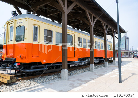 A Nomi Electric Railway (Nomiden) train car preserved and displayed at the east exit of Nomi-Negami Station | Nomiden | Nomi City, Ishikawa Prefecture 139170054