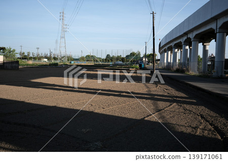 Fields and railway overpass on a sunny day Fields and railway overpass on a sunny day 139171061
