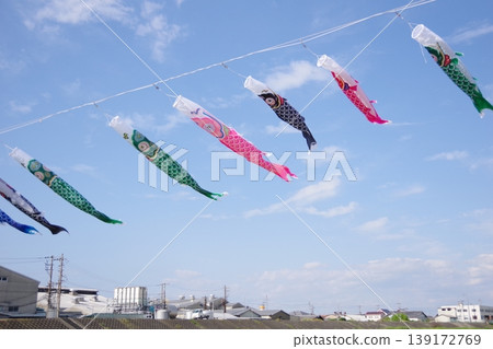 Carp streamer swimming in the blue sky Carp streamer swimming in the blue sky 139172769