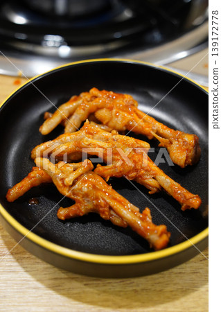 Spicy chicken feet dish popular in Korea Spicy chicken feet dish popular in Korea 139172778