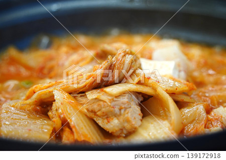 Traditional Korean Kimchi Stew with Pork and Tofu in a Hot Pot, Kimchi-jjigae Traditional Korean Kimchi Stew with Pork and Tofu in a Hot Pot, Kimchi-jjigae 139172918