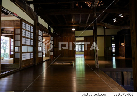 Green light streams in through the openings into the wooden floor of an old farmhouse - Former Uchida Residence, Tokyo Green light streams in through the openings into the wooden floor of an old farmhouse - Former Uchida Residence, Tokyo 139173405