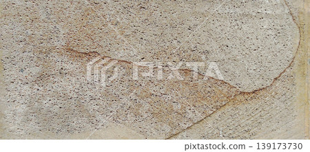 Shiva Gold Granite, a type of natural stone that is often used for construction and interior design. 139173730