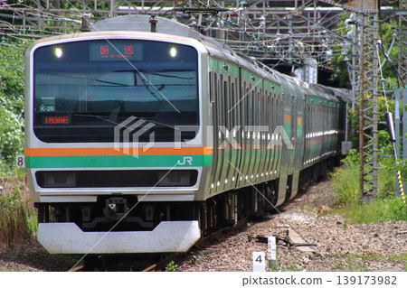 A Tokaido Line E231 series train emerges from the Aishoyama Tunnel and arrives at Atami Station. A Tokaido Line E231 series train emerges from the Aishoyama Tunnel and arrives at Atami Station. 139173982