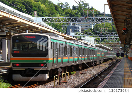 A Tokaido Line E231 series train stopped at Atami Station. A Tokaido Line E231 series train stopped at Atami Station. 139173984