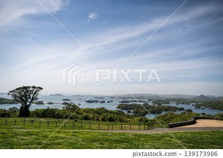 Kujukushima landscape with blue sky with white clouds and blue sea Kujukushima landscape with blue sky with white clouds and blue sea 139173986