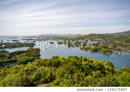 Kujukushima landscape with blue sky with white clouds and blue sea Kujukushima landscape with blue sky with white clouds and blue sea 139173997