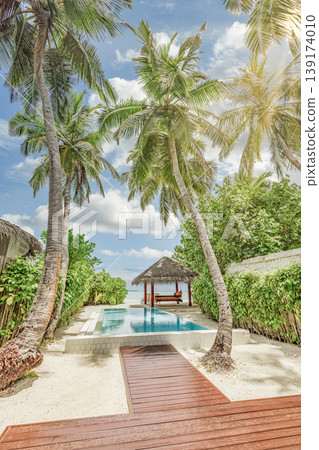 Paradise travel background outdoors amazing exotic destination scenic luxury tropical resort villa private pool palm trees sunshine ocean view high end summer holiday architecture leisure Paradise travel background outdoors amazing exotic destination scenic luxury tropical resort villa private pool palm trees sunshine ocean view high end summer holiday architecture leisure 139174010