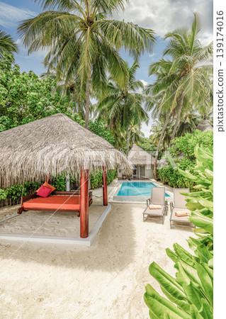 Tranquil tropical beach resort private pool palm trees sandy scenic canopy exotic travel destination summer tourism background peaceful poolside paradise luxury coastal retreat water horizon Tranquil tropical beach resort private pool palm trees sandy scenic canopy exotic travel destination summer tourism background peaceful poolside paradise luxury coastal retreat water horizon 139174016