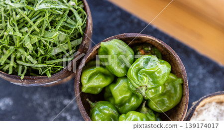 Top view fresh organic bell pepper kitchen background vegetable group raw red yellow green capsicum close up texture cooking ingredient salad nutrition harvest mix healthy diet food concept Top view fresh organic bell pepper kitchen background vegetable group raw red yellow green capsicum close up texture cooking ingredient salad nutrition harvest mix healthy diet food concept 139174017