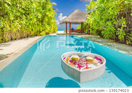 Radiant luxury tourism background summer travel couple honeymoon private pool floating breakfast tropical beach resort palm trees ocean view relaxing romantic vacation exotic villa leisure Radiant luxury tourism background summer travel couple honeymoon private pool floating breakfast tropical beach resort palm trees ocean view relaxing romantic vacation exotic villa leisure 139174023