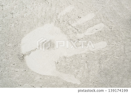 Imprint of a drawn hand made on the dust Imprint of a drawn hand made on the dust 139174199