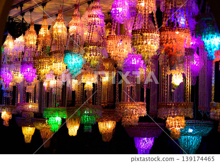 A colorful seashell chandelier lamp that shines beautifully in the darkness. A colorful seashell chandelier lamp that shines beautifully in the darkness. 139174465