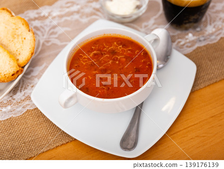 Borscht soup with beets served in bowl 139176139