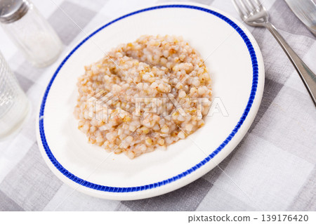 Buckwheat porridge served on plate Buckwheat porridge served on plate 139176420