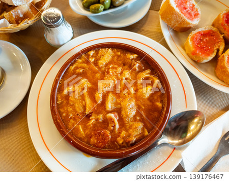 Portion of stewed tripe is cooked in plate - stomach of cattle 139176467