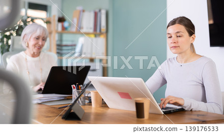 Businesswoman work on laptop in modern company office 139176533