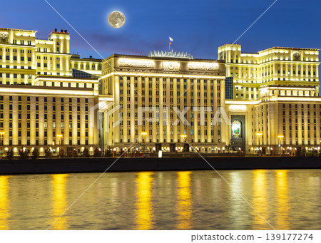 Main Building of the Ministry of Defence of the Russian Federation (Minoboron) -- inscription in Russian, at night (with the super moon) and Moskva River. Moscow, Russia Main Building of the Ministry of Defence of the Russian Federation (Minoboron) -- inscription in Russian, at night (with the super moon) and Moskva River. Moscow, Russia 139177274