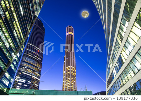 Skyscrapers International Business Center (City) at night with the super moon, Moscow, Russia Skyscrapers International Business Center (City) at night with the super moon, Moscow, Russia 139177336