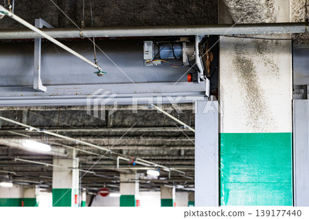 Multi-story parking garage with fire shutters Multi-story parking garage with fire shutters 139177440