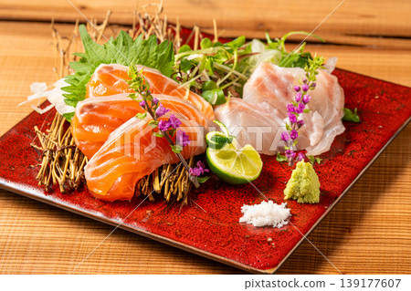 Assorted Sashimi Platter: A luxurious seafood plate featuring fresh sashimi. Assorted Sashimi Platter: A luxurious seafood plate featuring fresh sashimi. 139177607