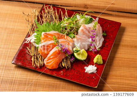 Assorted Sashimi Platter: A luxurious seafood plate featuring fresh sashimi. Assorted Sashimi Platter: A luxurious seafood plate featuring fresh sashimi. 139177609