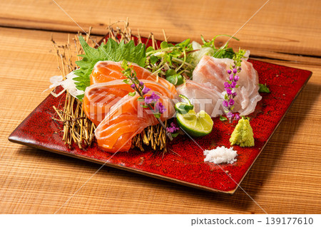 Assorted Sashimi Platter: A luxurious seafood plate featuring fresh sashimi. Assorted Sashimi Platter: A luxurious seafood plate featuring fresh sashimi. 139177610